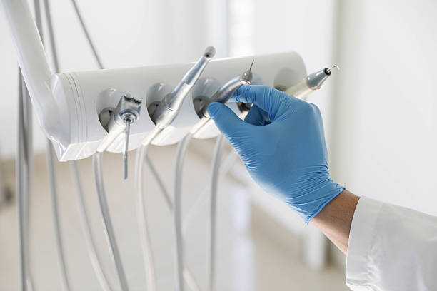 Professional Tooth Extraction technician working in Wellington, KS